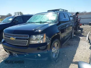 2011 Chevrolet Suburban LTZ with VIN 1GNSKKE33BR380376, listed as a IAAI auction lot 41825445 with 228,715 mi miles and . Bid and sale history available at DreamBid. Image 18.