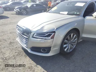 2017 Audi A8 with VIN WAU44AFD3HN014802, listed as a IAAI auction lot 42573537 with 121,096 mi miles and . Bid and sale history available at DreamBid. Image 6.