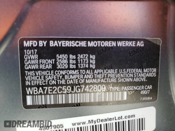 2018 BMW 7 Series 740i with VIN WBA7E2C59JG742809, listed as a Copart auction lot 66995934 with 62,017 mi miles and Salvage Title. Bid and sale history available at carsss.com. Image 14.