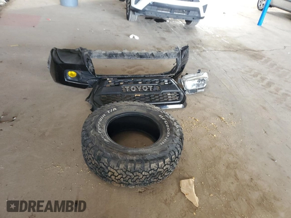 2020 Toyota Tacoma SR5 z VIN 5TFCZ5AN0LX229364, wystawiony jako Copart lot #55695505 z przebiegiem 69 908 mil mil oraz Szkoda całkowita • Salvage title. Historia ofert i sprzedaży dostępna na DreamBid. Obrazek 12.