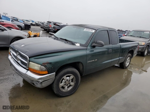 2002 Dodge Dakota SLT with VIN 1B7GL42X52S528521, listed as a Copart auction lot 85598784 with 168,740 mi miles and Salvage Title. Bid and sale history available at carsss.com. Image 1.