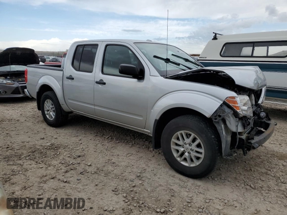 2018 Nissan Frontier Pro-4X with VIN 1N6AD0EV3JN730256, listed as a Copart auction lot 54273825 with 55,363 mi miles and Salvage title. Bid and sale history available at DreamBid. Image 4.