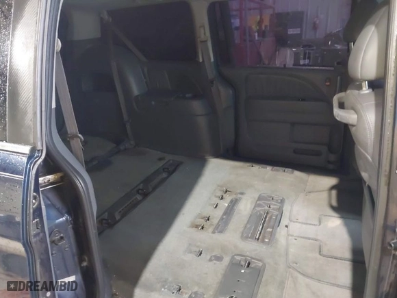 2007 Honda Odyssey EX-L with VIN 5FNRL38647B067415, listed as a IAAI auction lot 41690699 with 207,702 mi miles. Bid and sale history available at carsss.com. Image 8.
