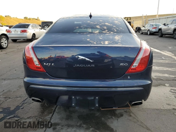2015 Jaguar XJ with VIN SAJWA2GT2FMV90837, listed as a Copart auction lot 71126294 with 92,973 mi miles and Clean Title. Bid and sale history available at DreamBid. Image 6.