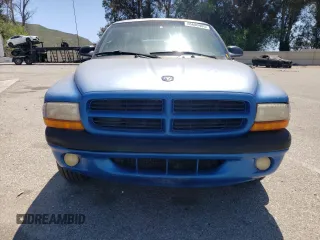 2000 Dodge Dakota z VIN 1B7FL26X5YS682973, wystawiony jako Copart lot #56680405 z przebiegiem 90 762 mil mil oraz Czysty tytuł • Clean title. Historia ofert i sprzedaży dostępna na DreamBid. Obrazek 5.