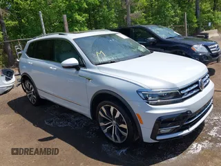 2019 Volkswagen Tiguan SEL Premium with VIN 3VV4B7AXXKM019995, listed as a IAAI auction lot 42170731 with 53,916 mi miles and . Bid and sale history available at DreamBid. Image 1.