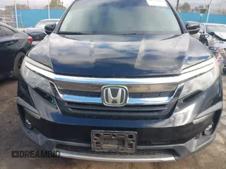 2019 Honda Pilot EX-L with VIN 5FNYF5H51KB013763, listed as a IAAI auction lot 41711089 with 79,651 mi miles and . Bid and sale history available at DreamBid. Image 12.