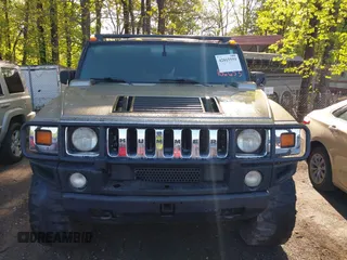 2005 Hummer H2 SUT with VIN 5GRGN22UX5H106653, listed as a IAAI auction lot 42015559 with 180,519 mi miles. Bid and sale history available at carsss.com. Image 12.