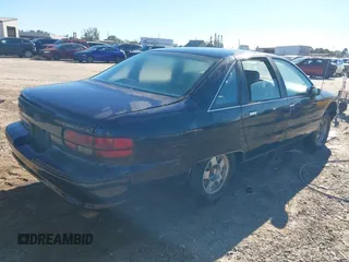 1991 Chevrolet Caprice z VIN 1G1BN53E2MW135068, wystawiony jako IAAI lot #40923869 z przebiegiem 185 732 mil mil oraz . Historia ofert i sprzedaży dostępna na DreamBid. Obrazek 4.