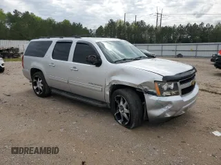 2014 Chevrolet Suburban LT z VIN 1GNSCJE00ER157634, wystawiony jako Copart lot #53271405 z przebiegiem 244 830 mil mil oraz Czysty tytuł • Clean title. Historia ofert i sprzedaży dostępna na DreamBid. Obrazek 4.