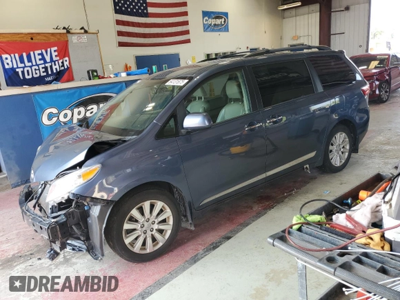 2015 Toyota Sienna Limited z VIN 5TDDK3DCXFS104812, wystawiony jako Copart lot #64131875 z przebiegiem 145 000 mil mil oraz Szkoda całkowita • Salvage title. Historia ofert i sprzedaży dostępna na DreamBid. Obrazek 1.