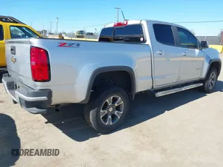 2019 Chevrolet Colorado 4WD Z71 z VIN 1GCGTDEN2K1146043, wystawiony jako IAAI lot #41712002 z przebiegiem 84 034 mil mil oraz . Historia ofert i sprzedaży dostępna na DreamBid. Obrazek 4.