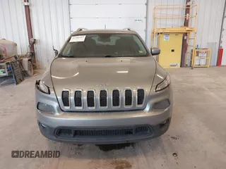 2014 Jeep Cherokee Latitude with VIN 1C4PJLCS1EW106004, listed as a IAAI auction lot 41786457 with 145,588 mi miles. Bid and sale history available at carsss.com. Image 12.