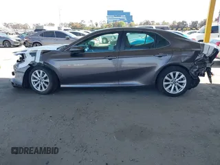 2019 Toyota Camry LE with VIN 4T1B11HK8KU204599, listed as a IAAI auction lot 42096889 with 76,518 mi miles and . Bid and sale history available at DreamBid. Image 15.