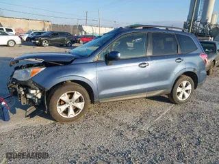 2014 Subaru Forester 2.5i Premium with VIN JF2SJAEC2EH417693, listed as a IAAI auction lot 41867774 with 98,084 mi miles. Bid and sale history available at carsss.com. Image 2.