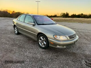 2001 Cadillac Catera z VIN W06VR54R01R009345, wystawiony jako Copart lot #80393534 z przebiegiem 43 757 mil mil oraz Tytuł czysty. Historia ofert i sprzedaży dostępna na DreamBid. Obrazek 1.