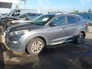 2017 Hyundai Tucson SE Plus with VIN KM8J33A40HU329666, listed as a IAAI auction lot 42084886 with 144,785 mi miles. Bid and sale history available at carsss.com. Image 14.