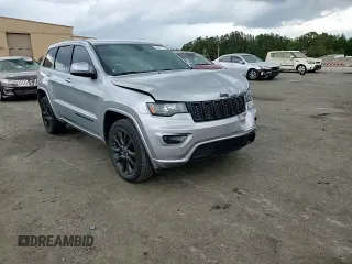 2018 Jeep Grand Cherokee Altitude with VIN 1C4RJEAG9JC246753, listed as a Copart auction lot 54497745 with 121,665 mi miles and Salvage title. Bid and sale history available at DreamBid. Image 14.