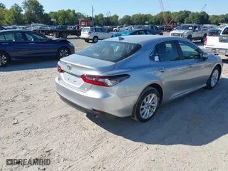 2024 Toyota Camry LE with VIN 4T1C11AK4RU194873, listed as a IAAI auction lot 40269603 with 5,619 mi miles. Bid and sale history available at carsss.com. Image 4.