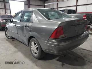 2003 Ford Focus SE with VIN 1FAFP34333W164636, listed as a IAAI auction lot 41412000 with 175,276 mi miles and . Bid and sale history available at carsss.com. Image 3.