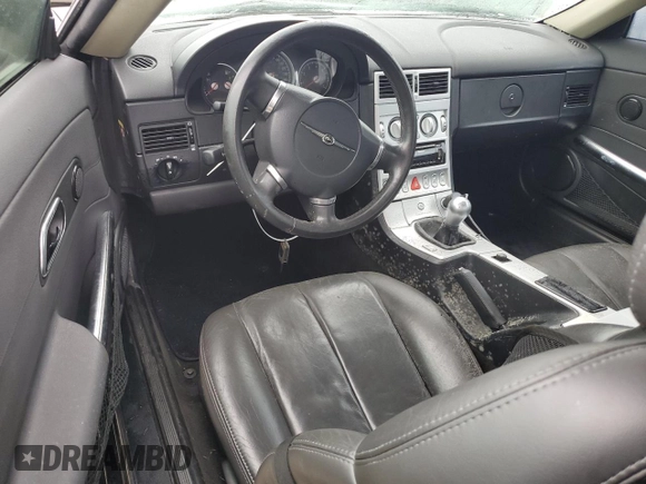 2005 Chrysler Crossfire z VIN 1C3AN59L95X032917, wystawiony jako Copart lot #75003614 z przebiegiem Nie podano mil oraz Szkody całkowita. Historia ofert i sprzedaży dostępna na DreamBid. Obrazek 8.
