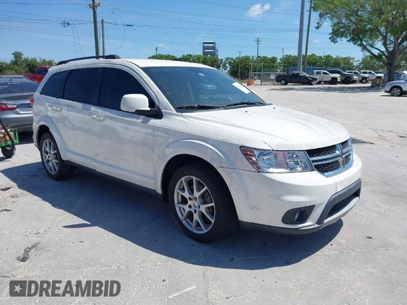 2014 Dodge Journey SXT with VIN 3C4PDCBG4ET235848, listed as a IAAI auction lot 41824155 with 48,691 mi miles and . Bid and sale history available at DreamBid. Image 1.