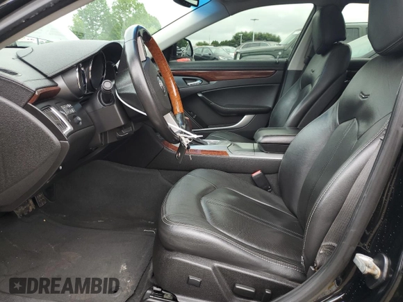 2012 Cadillac CTS Luxury with VIN 1G6DG5E54C0158220, listed as a Copart auction lot 58929735 with 107,667 mi miles and Salvage title. Bid and sale history available at DreamBid. Image 7.
