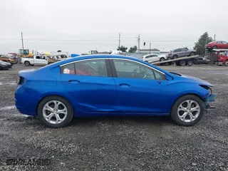 2016 Chevrolet Cruze Premier with VIN 3G1BG5SM1GS600104, listed as a IAAI auction lot 41311900 with 64,676 mi miles. Bid and sale history available at carsss.com. Image 14.