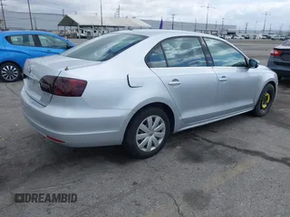 2013 Volkswagen Jetta Sedan SE with VIN 3VWDP7AJ5DM292211, listed as a IAAI auction lot 42129945 with 103,705 mi miles. Bid and sale history available at carsss.com. Image 4.