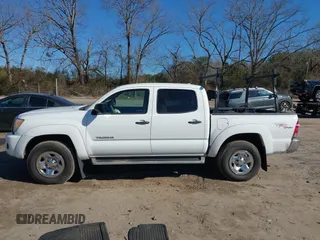 2009 Toyota Tacoma PreRunner with VIN 3TMJU62N79M078810, listed as a IAAI auction lot 41358051 with 154,001 mi miles. Bid and sale history available at carsss.com. Image 14.