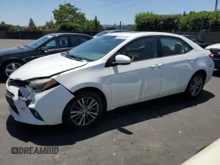 2014 Toyota Corolla L with VIN 5YFBURHE1EP042496, listed as a Copart auction lot 56871415 with 162,237 mi miles and Salvage title. Bid and sale history available at DreamBid. Image 1.