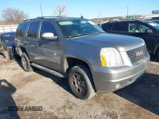 2012 GMC Yukon SLE with VIN 1GKS1AE06CR218372, listed as a IAAI auction lot 41591288 with 166,596 mi miles. Bid and sale history available at carsss.com. Image 1.