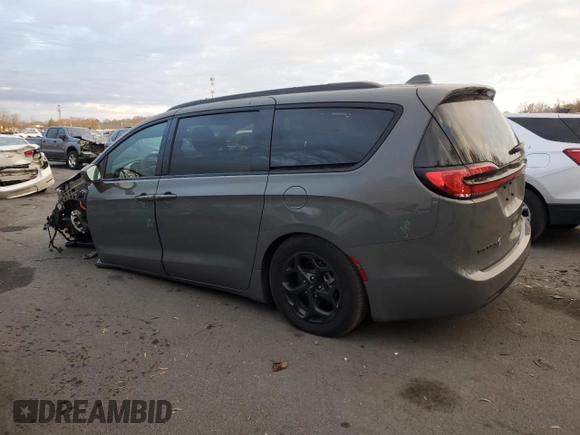 2021 Chrysler Pacifica Hybrid Limited z VIN 2C4RC1S71MR569059, wystawiony jako Copart lot #81278244 z przebiegiem 27 662 mil mil oraz Szkoda całkowita • Salvage title. Historia ofert i sprzedaży dostępna na DreamBid. Obrazek 2.