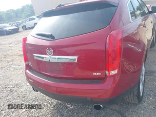 2015 Cadillac SRX Performance Collection z VIN 3GYFNCE37FS567267, wystawiony jako IAAI lot #42160129 z przebiegiem 144 948 mil mil oraz . Historia ofert i sprzedaży dostępna na DreamBid. Obrazek 17.