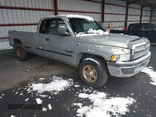2000 Dodge Ram 2500 with VIN 1B7KC2361YJ127325, listed as a IAAI auction lot 41981547 with 165,410 mi miles. Bid and sale history available at carsss.com. Image 1.