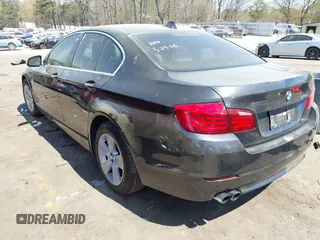 2012 BMW 5 Series 528i with VIN WBAXG5C58CDY28516, listed as a IAAI auction lot 41907803 with 116,499 mi miles. Bid and sale history available at carsss.com. Image 3.