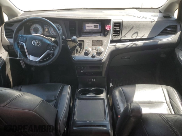 2015 Toyota Sienna SE с VIN 5TDXK3DC6FS632845, выставлен на аукционе Copart как лот 56070745 с пробегом 154 254 миль миль и Списание • Salvage title. История ставок и продаж доступна на DreamBid. Изображение 8.