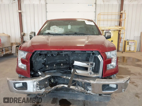 2015 Ford F-150 XLT with VIN 1FTEW1EG8FFA41398, listed as a IAAI auction lot 42102711 with 129,812 mi miles and . Bid and sale history available at DreamBid. Image 12.