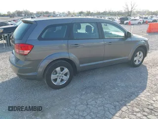 2013 Dodge Journey American Value with VIN 3C4PDCAB2DT501243, listed as a IAAI auction lot 41928930 with 147,437 mi miles and . Bid and sale history available at DreamBid. Image 4.