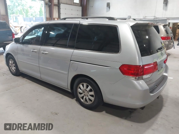 2010 Honda Odyssey EX-L z VIN 5FNRL3H75AB009698, wystawiony jako IAAI lot #42855966 z przebiegiem 215 138 mil mil oraz . Historia ofert i sprzedaży dostępna na DreamBid. Obrazek 3.