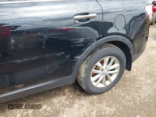 2016 Kia Sorento LX with VIN 5XYPGDA5XGG168325, listed as a IAAI auction lot 42123471 with 267,254 mi miles. Bid and sale history available at carsss.com. Image 6.