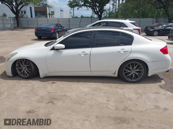 2013 Infiniti G37 Sedan Journey with VIN JN1CV6AP7DM304618, listed as a IAAI auction lot 42189023 with 89,980 mi miles. Bid and sale history available at carsss.com. Image 14.