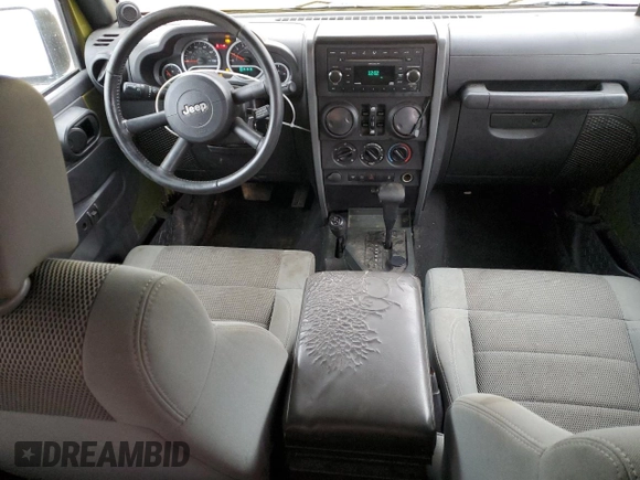 2007 Jeep Wrangler Unlimited Rubicon с VIN 1J4GA691X7L145737, выставлен на аукционе Copart как лот 86277914 с пробегом 285 624 миль миль и Списание • Salvage title. История ставок и продаж доступна на DreamBid. Изображение 8.