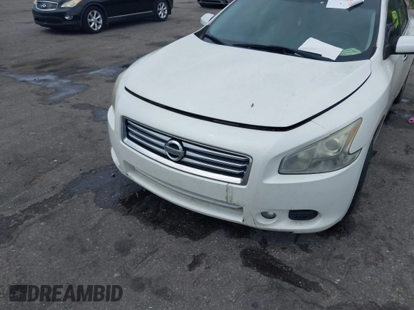 2013 Nissan Maxima S with VIN 1N4AA5AP5DC816187, listed as a IAAI auction lot 42092038 with 158,079 mi miles and . Bid and sale history available at DreamBid. Image 6.