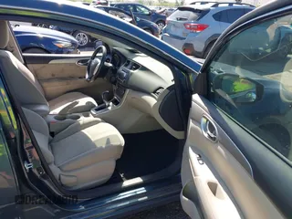 2015 Nissan Sentra SV with VIN 3N1AB7AP9FL688596, listed as a IAAI auction lot 42082292 with 77,300 mi miles and . Bid and sale history available at DreamBid. Image 5.