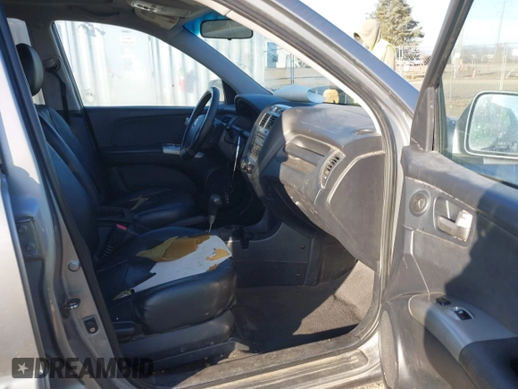 2006 Kia Sportage LX with VIN KNDJE723X67242610, listed as a IAAI auction lot 41735144 with 244,979 mi miles and . Bid and sale history available at DreamBid. Image 5.