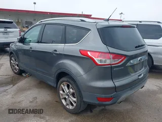 2014 Ford Escape Titanium with VIN 1FMCU0JX8EUD31028, listed as a IAAI auction lot 41943690 with 91,295 mi miles. Bid and sale history available at carsss.com. Image 3.
