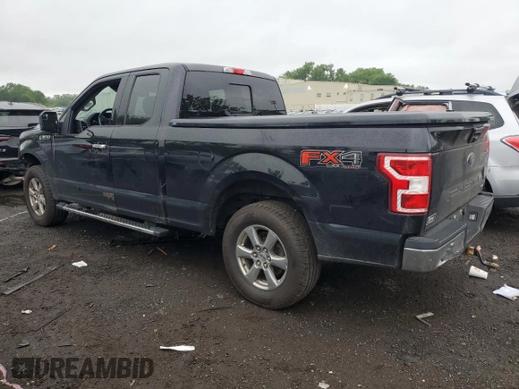 2018 Ford F-150 XL with VIN 1FTEX1EP8JFB61160, listed as a Copart auction lot 59914935 with 97,564 mi miles and Salvage title. Bid and sale history available at DreamBid. Image 2.
