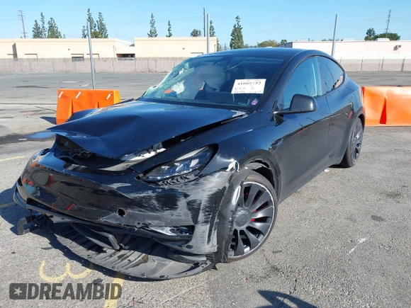 2022 Tesla Model Y Performance with VIN 7SAYGDEF5NF336693, listed as a IAAI auction lot 41805752 with 42,009 mi miles and . Bid and sale history available at DreamBid. Image 19.