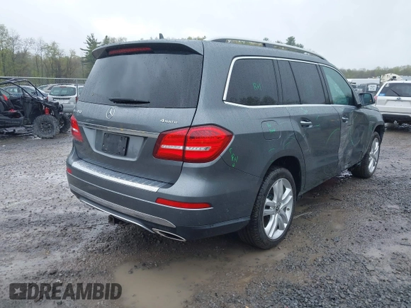 2018 Mercedes-Benz GLS 450 z VIN 4JGDF6EE5JB106257, wystawiony jako IAAI lot #42187413 z przebiegiem 104 217 mil mil oraz . Historia ofert i sprzedaży dostępna na DreamBid. Obrazek 4.